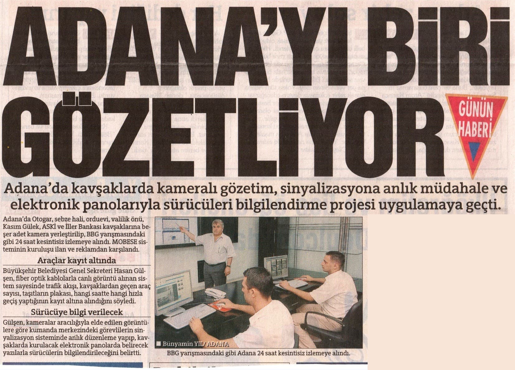 Gazete kupürü: "Adana'yı biri gözetliyor" başlıklı haber; kavşaklarda kameralı gözetim projesi (arşiv)